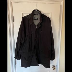 Newport Harbor Rain Coat with fold away hood.